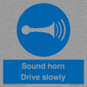 sound-horn-drive-slowly-warehousing-and-delivery-sign~